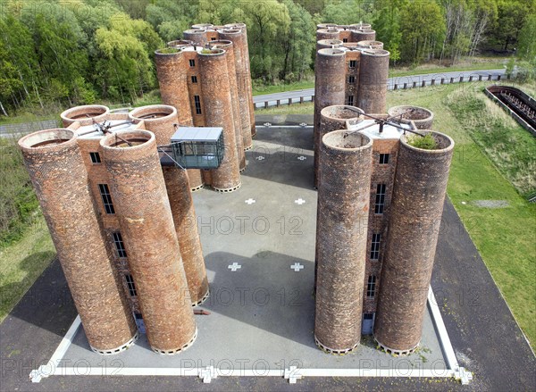 An aerial photo shows 24 brick towers rising 22 metres into the sky above Lauchhammer. They are the only remaining part of a coking plant, the Lauchhammer Biotowers. Their polluted wastewater was treated in the towers using a biological process, 06/05/2015