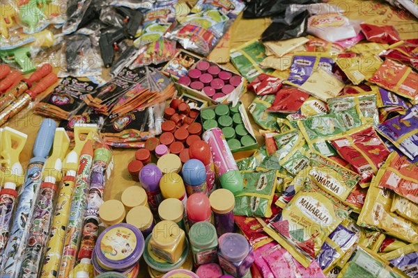 Vendor sells Holi celebration items in a street market, ahead of Holi festival on March 23, 2024 in Guwahati, Assam, India. Holi is the Hindu festival of colours, it is celebrated with great joy in India