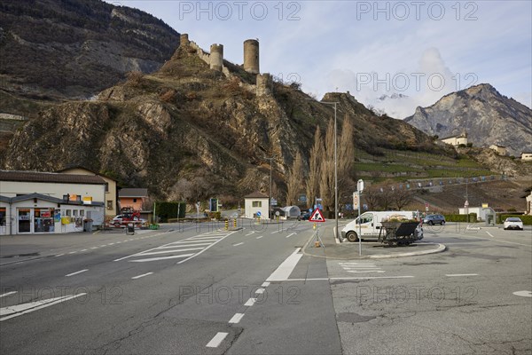 Saillon Castle with the Bayart tower and road in Saillon, district of Martigny, canton of Valais, Switzerland, Europe