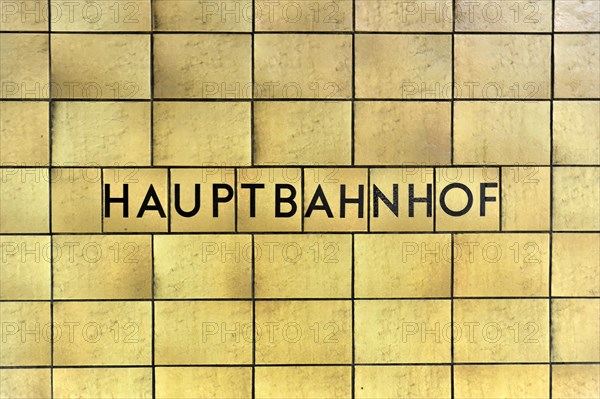 Yellow wall tiles with the lettering 'central railway station' on a railway station wall, Hamburg, Hanseatic City of Hamburg, Germany, Europe
