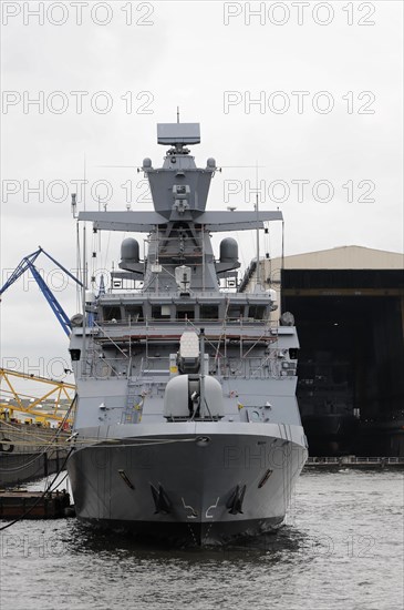 Grey military ship in the harbour, equipped with gun turrets, Hamburg, Hanseatic City of Hamburg, Germany, Europe