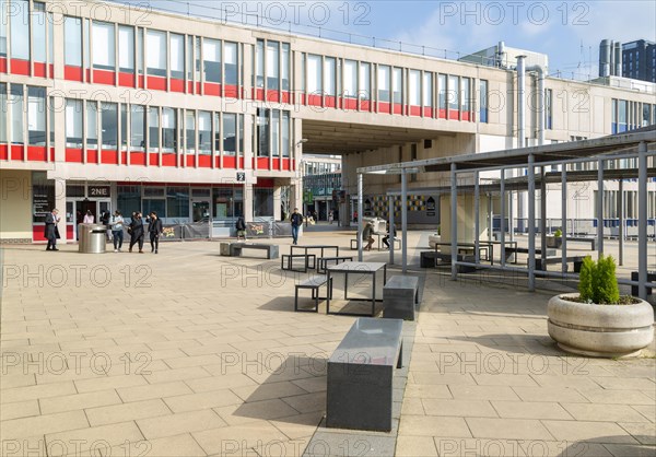 Students in one of the campus squares, University of Essex, Colchester, Essex, England, UK
