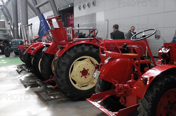 RETRO CLASSICS 2010, Stuttgart Messe, series of old red tractors presented as an exhibited collection, Stuttgart Messe, Stuttgart, Baden-Wuerttemberg, Germany, Europe