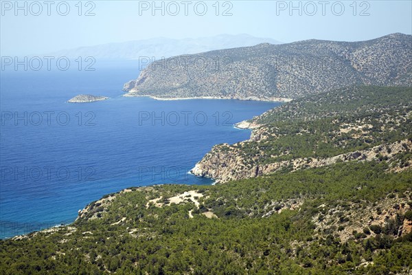 Coastal view over pine forest Kastrou Monolithos, Rhodes, Greece, Europe
