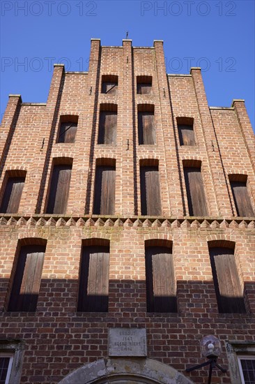 Brick facade of the Hansehaus in the old town centre of Minden, Muehlenkreis Minden-Luebbecke, North Rhine-Westphalia, Germany, Europe