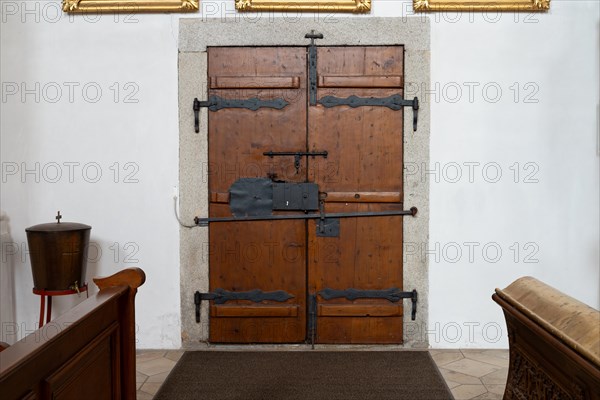 An old church door, locked with several latches, from the early 18th century, Church St. Michael, Michaelsbuch, Lower Bavaria, Germany, Europe