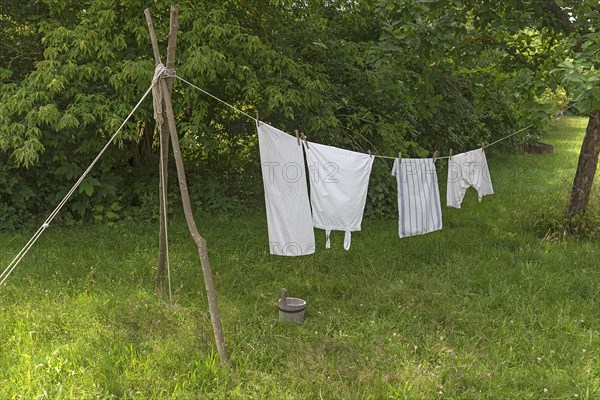 Laundry on the line in the garden, Open-Air Museum of Folklore Schwerin-Muess, Mecklenburg-Vorpommerm, Germany, Europe