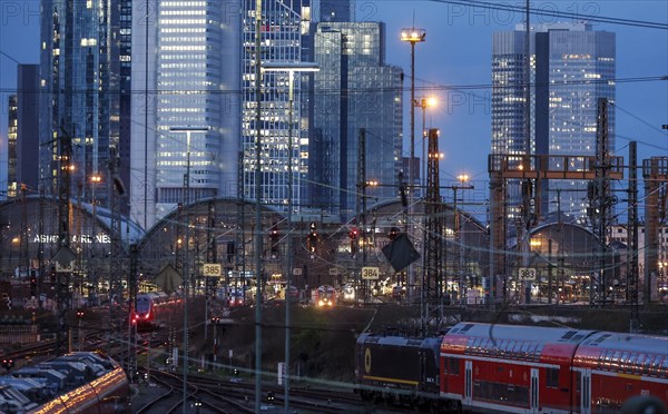 Trains at Frankfurt Central Station, Frankfurt skyline with skyscrapers in the background, 15/03/2024