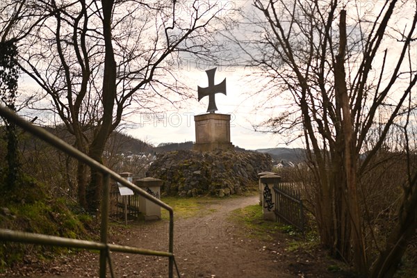 Iserlohn. Thanks to the climate change, early spring has come earlier than usual. The flowering plants in the front gardens are already showing their splendour. Monument to the Iron Cross erected in 1813. Thanks to climate change, early spring is coming earlier than usual this year