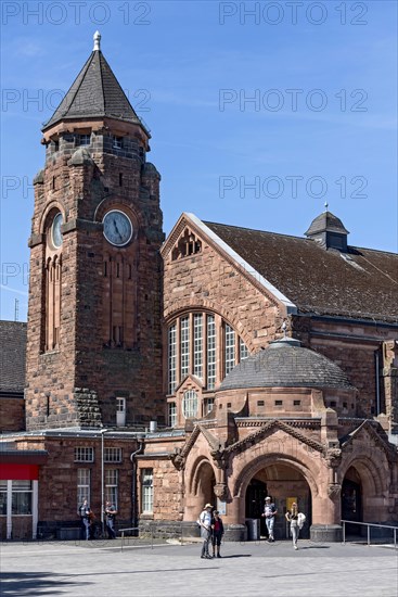Historic Wilhelmine railway station, clock tower, pavilion with entrance to the station building, neo-Romanesque and Art Nouveau, red sandstone, cultural monument, listed building, Giessen, Giessen, Hesse, Germany, Europe