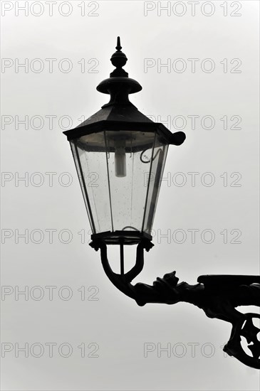 Silhouette of a street lamp in front of a bright, overcast sky in black and white, Hamburg, Hanseatic City of Hamburg, Germany, Europe