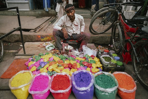 Vendor sells Holi celebration items in a street market, ahead of Holi festival on March 23, 2024 in Guwahati, Assam, India. Holi is the Hindu festival of colours, it is celebrated with great joy in India