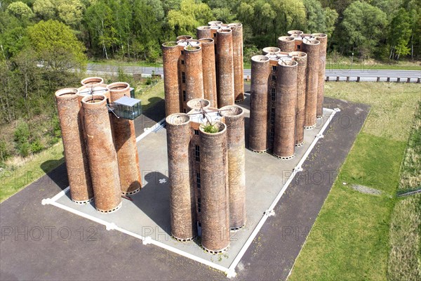An aerial photo shows 24 brick towers rising 22 metres into the sky above Lauchhammer. They are the only remaining part of a coking plant, the Lauchhammer Biotowers. Their polluted wastewater was treated in the towers using a biological process, 06/05/2015