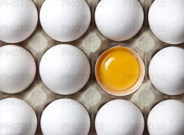 Eggs and egg yolks in an egg carton, 14/03/2015