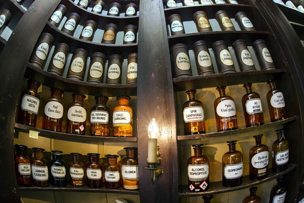 Glass jars with ingredients for medicines stand on a shelf in the historic Berg-Apotheke pharmacy in Clausthal-Zellerfeld, which was built in 1674 and is one of the oldest pharmacy buildings in Germany, 09 November 2015