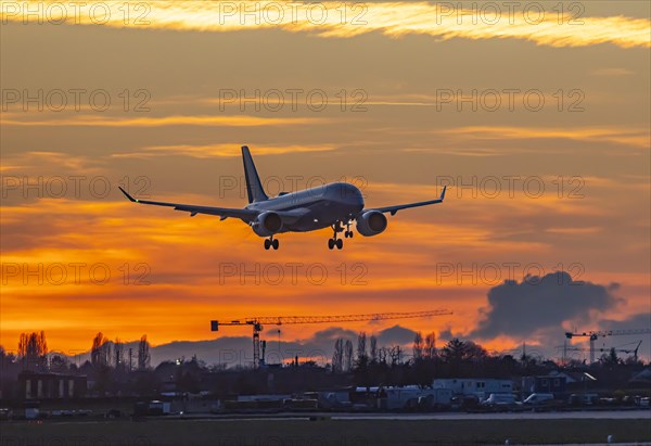 Evening sky with sunset at the airport, aeroplane landing, Stuttgart, Baden-Wuerttemberg, Germany, Europe