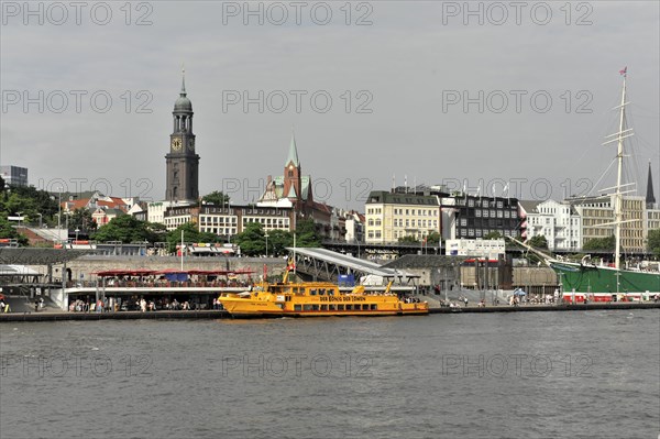 Hamburg harbour view with ships and clock tower by day, Hamburg, Hanseatic City of Hamburg, Germany, Europe
