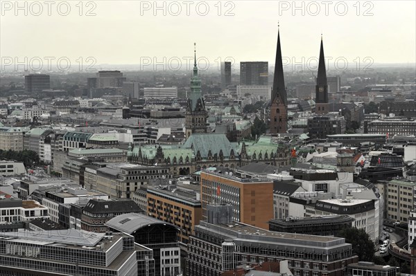 Wide view over a city with church towers and roofs under a cloudy sky, Hamburg, Hanseatic City of Hamburg, Germany, Europe