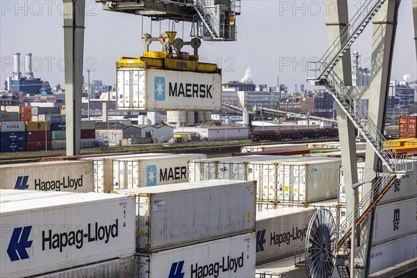 Container terminal in the port of Mannheim, sea containers are stacked in one of the most important inland ports in Europe, trimodal transport node, infrastructure for the exchange of goods, Mannheim, Baden-Wuerttemberg, Germany, Europe