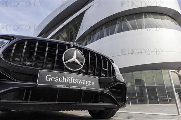 Mercedes company car, radiator grille and Mercedes star on a modern vehicle, in the background the Mercedes-Benz Museum, Baden-Wuerttemberg, Germany, Europe