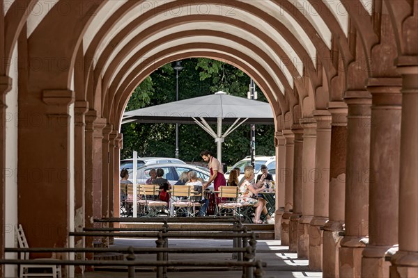 Restaurant and street cafe with waiter and guests, historic market arbours, archway with columns, arcades, Giessen weekly market market, old town, Giessen, Giessen, Hesse, Germany, Europe