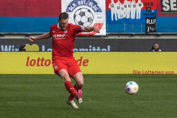 Football match, shot by captain Patrick MAINKA 1.FC Heidenheim, Voith-Arena football stadium, Heidenheim