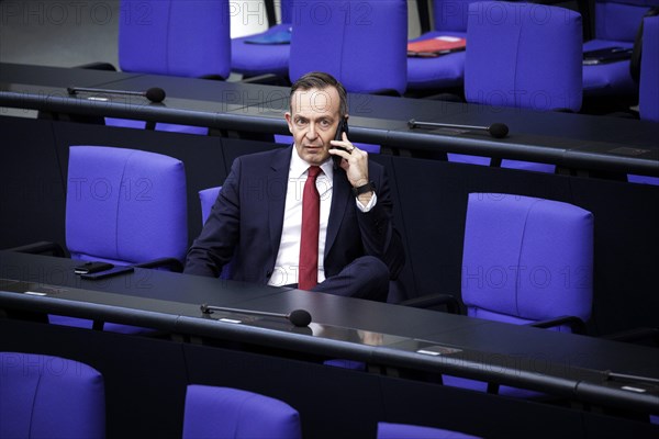 Volker Wissing, Federal Minister of Transport and Digital Affairs, on the phone shortly in front of the start of a session in the German Bundestag. Berlin, 20.03.2024