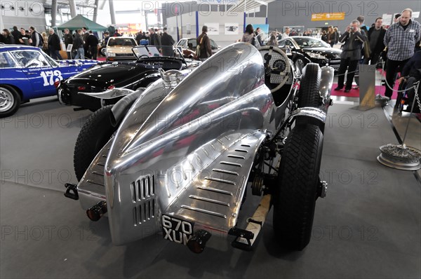 RETRO CLASSICS 2010, Stuttgart Messe, Stuttgart, Baden-Wuerttemberg, Germany, Europe, SIDDELEY 5500 Streamline, built in 1936, polished silver vintage racing car in an exhibition hall with visitors, Europe