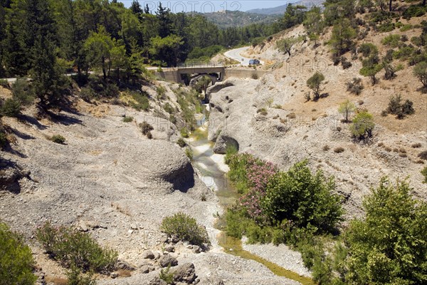 River vertical erosion through conglomerate rock beds, Rhodes, Greece, Europe