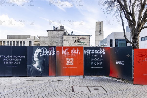 Benko has gambled away. Graffiti on a construction fence in Stuttgart city centre. Signa Real Estate was planning a commercial building for retail, catering and offices on the corner of Koenigstrasse and Schulstrasse. However, the insolvency of the department stores' chain Galeria Karstadt Kaufhof has left the future of the prime property open. Stuttgart, Baden-Wuerttemberg, Germany, Europe