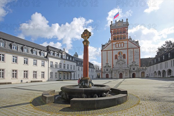 Forecourt with fountain, cross and column and Romanesque St Matthias Church, Benedictine Abbey, Trier, Rhineland-Palatinate, Germany, Europe
