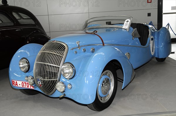 RETRO CLASSICS 2010, Stuttgart Messe, A striking blue convertible classic car with white stripes and chrome details, Stuttgart Messe, Stuttgart, Baden-Wuerttemberg, Germany, Europe