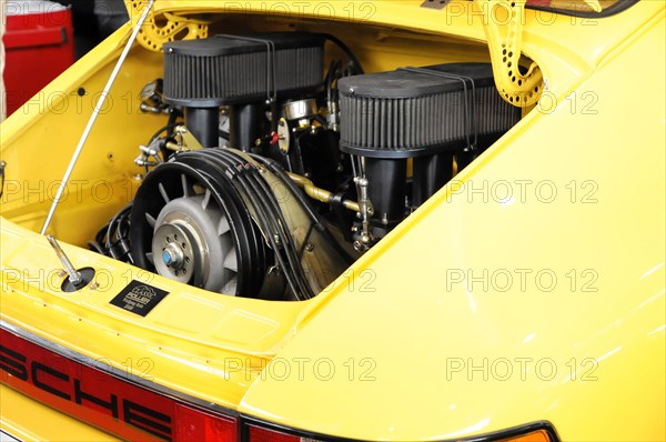 RETRO CLASSICS 2010, Stuttgart Trade Fair Centre, Engine compartment of a yellow Porsche high-performance sports car with visible details, Stuttgart Trade Fair Centre, Stuttgart, Baden-Wuerttemberg, Germany, Europe