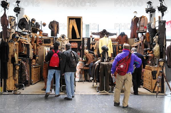 RETRO CLASSICS 2010, Stuttgart Messe, Stuttgart, Baden-Wuerttemberg, Germany, Europe, Stand with leather goods at a market full of visitors, Europe