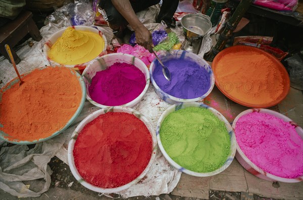 Vendor sells Holi celebration items in a street market, ahead of Holi festival on March 23, 2024 in Guwahati, Assam, India. Holi is the Hindu festival of colours, it is celebrated with great joy in India