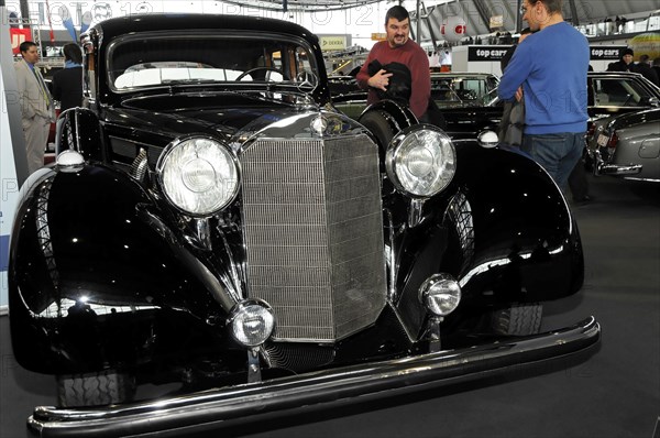 RETRO CLASSICS 2010, Stuttgart Messe, Stuttgart, Front view of a black Mercedes-Benz classic car with chrome details at an automobile show, Stuttgart Messe, Stuttgart, Baden-Wuerttemberg, Germany, Europe