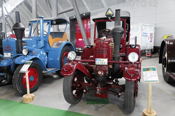 RETRO CLASSICS 2010, Stuttgart Trade Fair, Retro Lanz Bulldog in red colour presented in an exhibition, Stuttgart Trade Fair, Stuttgart, Baden-Wuerttemberg, Germany, Europe