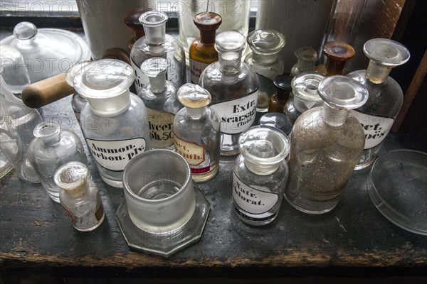 Glass jars for the production of medicines stand in the former laboratory in the historic Berg Pharmacy in Clausthal-Zellerfeld. The current Berg-Apotheke, one of the oldest pharmacies in Germany, was built in 1674, 09.11.2015