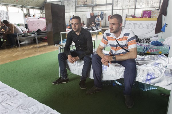 Refugees are housed in a gymnasium at the central contact point for asylum seekers in the state of Brandenburg, 03/06/2015