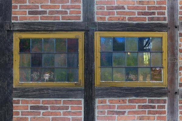 Colourful window panes of a 19th century smithy, Open-Air Museum of Folklore Schwerin-Muess, Mecklenburg-Western Pomerania, Germany, Europe