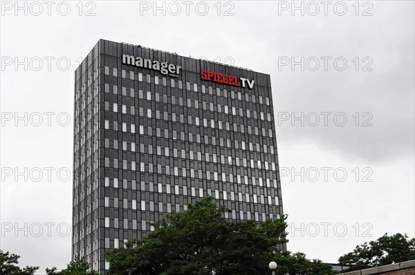 High-rise building labelled Spiegel TV and manager against a cloudy sky, Hamburg, Hanseatic City of Hamburg, Germany, Europe