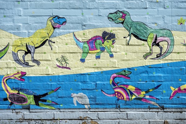 Animals of prehistoric times on water and land, ichthyosaurs, dinosaurs, colourful illustration, children's drawing on the wall of the Hermann Hoffmann Academy, Justus Liebig University JLU, Altstadt, Giessen, Giessen, Hesse, Germany, Europe