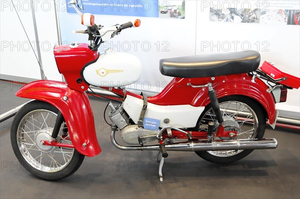 RETRO CLASSICS 2010, Stuttgart Messe, Red and white Simson Schwalbe moped in an exhibition hall, Stuttgart Messe, Stuttgart, Baden-Wuerttemberg, Germany, Europe