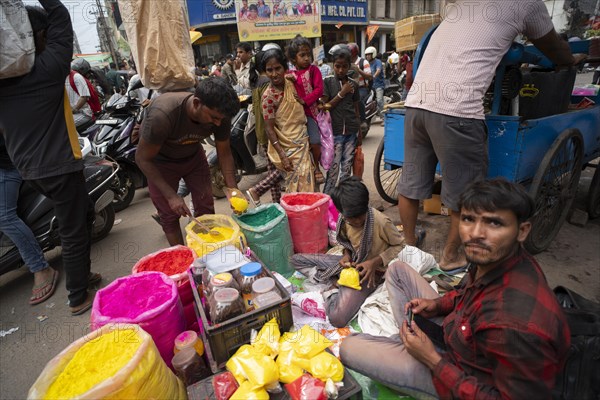 Vendor sells Holi celebration items in a street market, ahead of Holi festival on March 23, 2024 in Guwahati, Assam, India. Holi is the Hindu festival of colours, it is celebrated with great joy in India