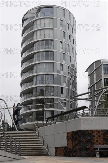 Round, modern glass building next to a staircase on a cloudy day, Hamburg, Hanseatic City of Hamburg, Germany, Europe