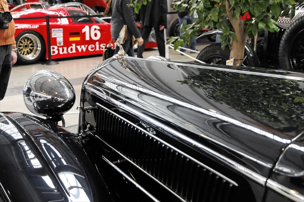 RETRO CLASSICS 2010, Stuttgart Messe, close-up of the emblem-covered radiator grille of a classic car (DELAHAY) in front of a Budweiser lorry, Stuttgart Messe, Stuttgart, Baden-Wuerttemberg, Germany, Europe