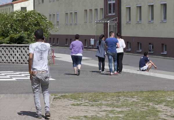 Refugees at the central contact point for asylum seekers in the state of Brandenburg in Eisenhuettenstadt, 03.06.201.5