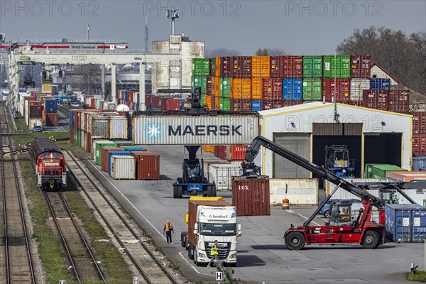 Container terminal in the port of Mannheim, sea containers are stacked in one of the most important inland ports in Europe, trimodal transport node, infrastructure for the exchange of goods, Mannheim, Baden-Wuerttemberg, Germany, Europe