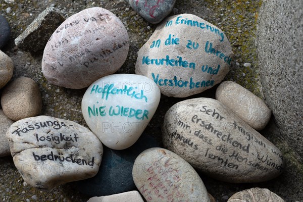 Memorial in Mainkofen for the 1300 patients of the Mainkofen District Hospital who were murdered during the Third Reich, pebbles inscribed by visitors, Bavaria, Germany, Europe