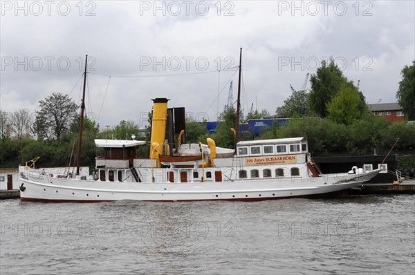 A restored historic steamship, SCHAARHOeRN, moored on the shore, Hamburg, Hanseatic City of Hamburg, Germany, Europe
